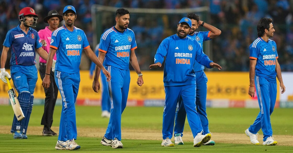 Rohit Sharma, third right,  reacts after winning the match against Afghanistan. Photo: PTI//Shailendra Bhojak