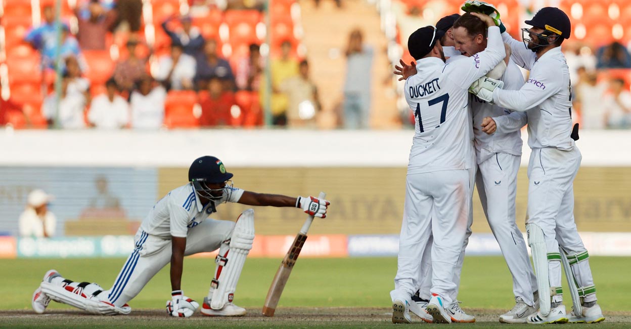 Tom Hartley celebrates with teammates after taking the wicket of Srikar Bharat . Photo: Reuters/Francis Mascarenhas
