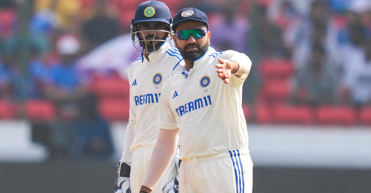 Rohit Sharma adjusts the field during the Hyderabd Test as K S Bharat looks on. File photo: PTI/Shailendra Bhojak