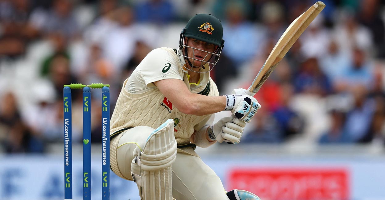 Australia's Steve Smith celebrates reaching his century (100 runs) on the second day of the fourth cricket Test match between Australia and India at the Melbourne Cricket Ground (MCG) in Melbourne on December 27, 2024. (Photo by Martin KEEP / AFP) / -- IMAGE RESTRICTED TO EDITORIAL USE - STRICTLY NO COMMERCIAL USE --