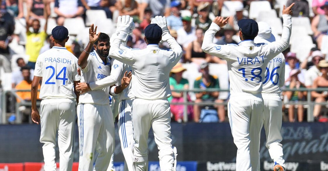 Jasprit Bumrah, second left, celebrates with teammates after picking up a wicket. Photo: AFP/Rodger Bosch