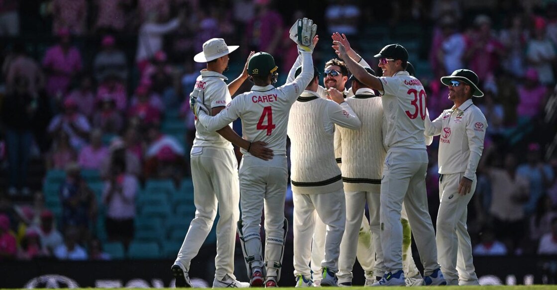 Australian players celebrate the dismissal of Babar Azam in the ogoing Sydney Test. Photo: AFP/Saeed Khan