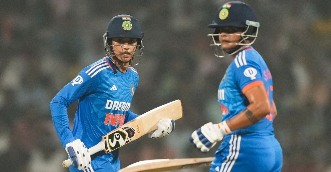 Smriti Mandhana and Shafali Verma run between the wickets during the T20I cricket match between India and Australia, at DY Patil stadium, in Navi Mumbai, Friday, January 5, 2024. Photo: PTI