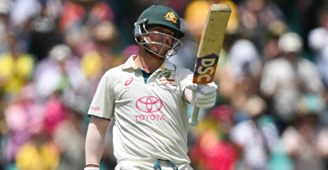David Warner celebrates his fifty. Photo: AFP/Saeed Khan