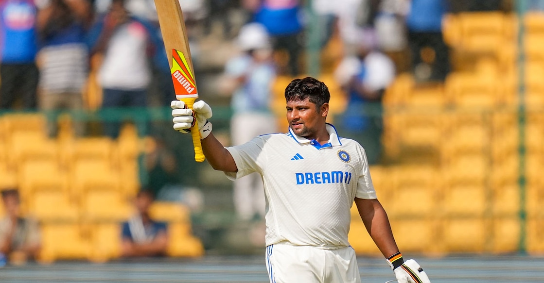 India's Sarfaraz Khan celebrates his 150 runs during the fourth day of the first Test against New Zealand at M Chinnaswamy Stadium in Bengaluru on Saturday. Photo: PTI