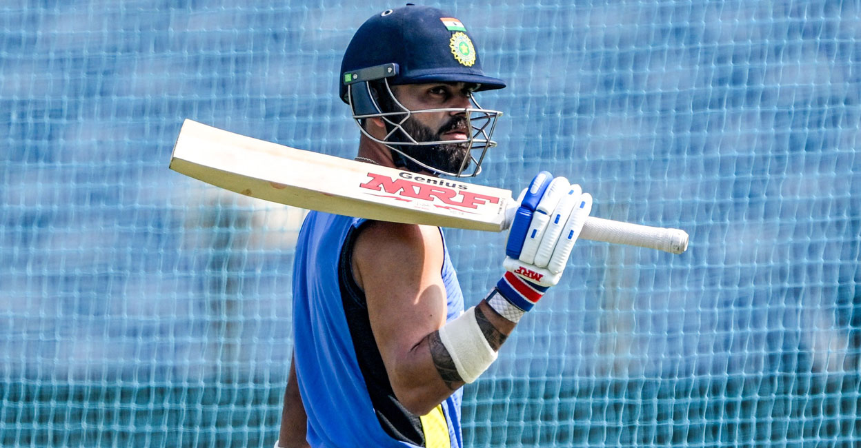 India's Virat Kohli attends a practice session on the eve of their second Test against New Zealand at the Maharashtra Cricket Association Stadium in Pune on Wednesday. Photo: AFP/ Punit Paranjpe