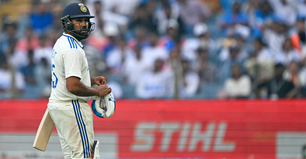 CRICKET-IND-NZL-TEST Indian skipper Rohit Sharma was dismissed early by Mitchell Santner of New Zealand in the first session of third day's play in the third Test in Pune. Photo: AFP