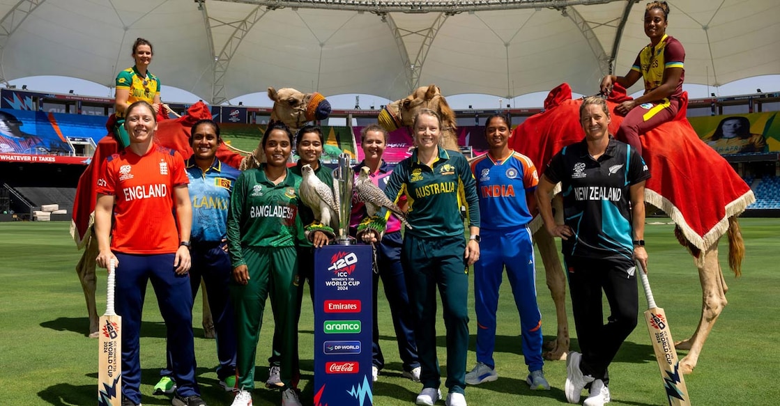 Captains pose with the T20 World Cup trophy. Photo: X@BCCIWomen