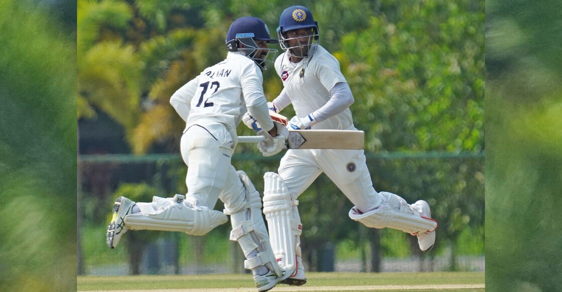 Salman Nizar and Sachin Baby take a run during day two of Kerala's Ranji Trophy match against Uttar Pradesh at Thumba on Thursday. Photo: KCA