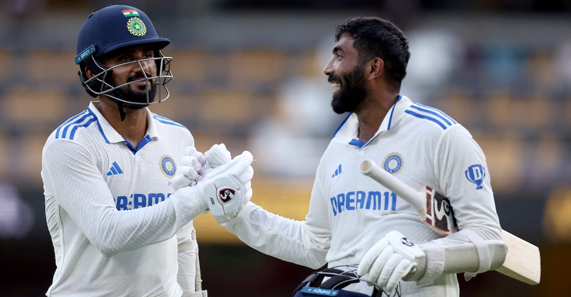 India's Akash Deep (left) and Jasprit Bumrah react as they leave the ground at the end of day four of the third Test against Australia at The Gabba in Brisbane on December 17, 2024. Photo: AFP/ David Gray