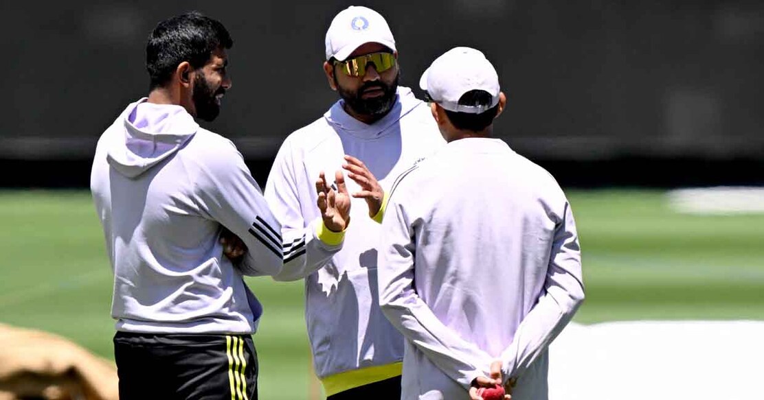 Indian bowler Jasprit Bumrah (L), captain Rohit Sharma (C) and coach Gautam Gambhir (R) inspect the match wicket at the Melbourne Cricket Ground (MCG) in Melbourne on December 24, 2024, ahead of the fourth cricket Test match between Australia and India starting December 26. (Photo by William WEST / AFP) / --IMAGE RESTRICTED TO EDITORIAL USE - STRICTLY NO COMMERCIAL USE--