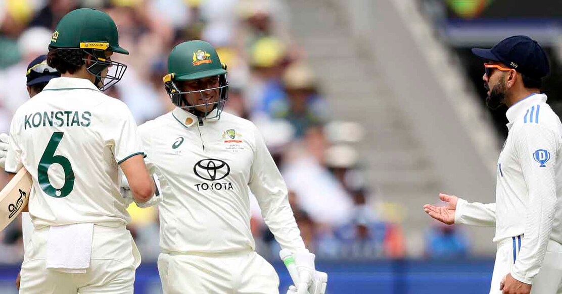 Australia's Sam Konstas (L) chats with India's Virat Kohli (R) on day one of the fourth cricket Test match between Australia and India at the Melbourne Cricket Ground (MCG) in Melbourne on December 26, 2024. (Photo by Martin KEEP / AFP) / -- IMAGE RESTRICTED TO EDITORIAL USE - STRICTLY NO COMMERCIAL USE --