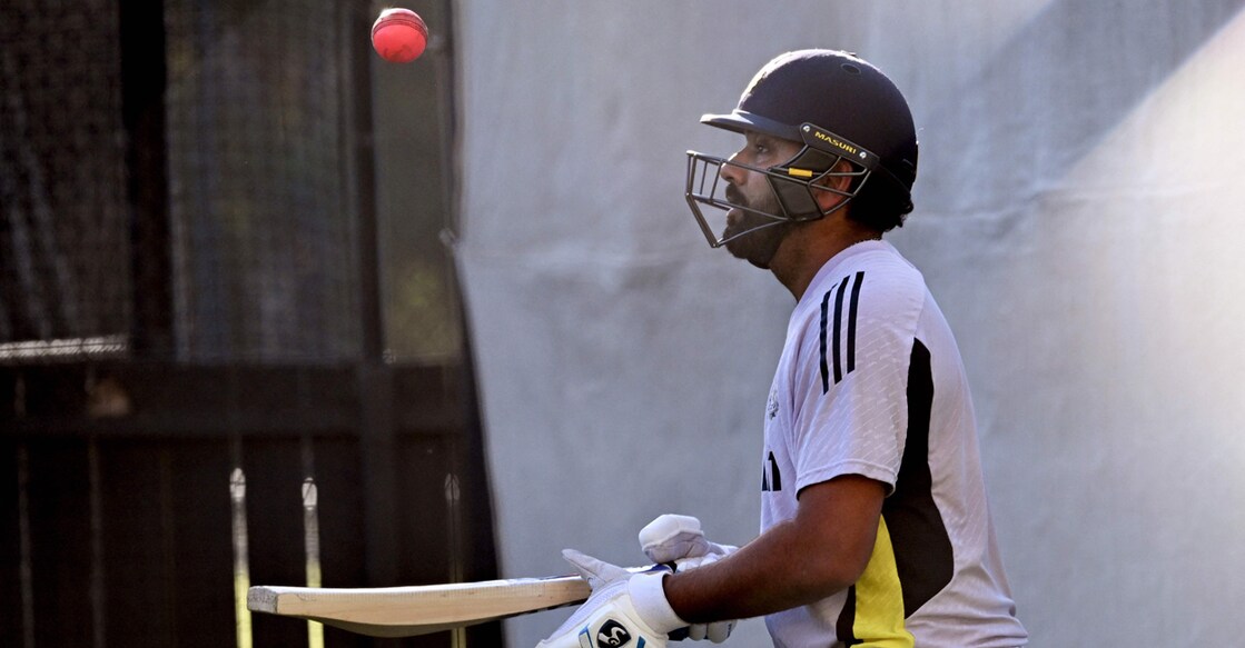 CRICKET-AUS-IND India's captain Rohit Sharma bounces the ball on his bat during a training session at the Adelaide Oval in Adelaide on December 5, 2024. Photo: AFP/ William West