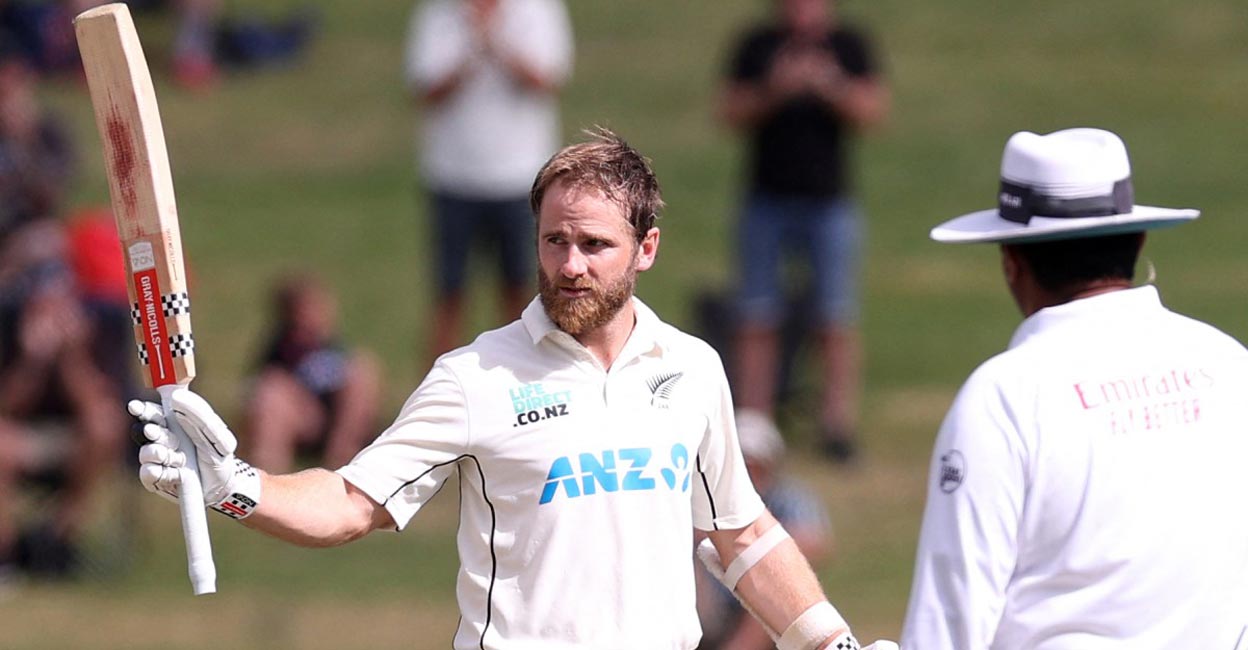 Kane Williamson celebrates his 32nd Test hundred. Photo: AFP/Fiona Goodall