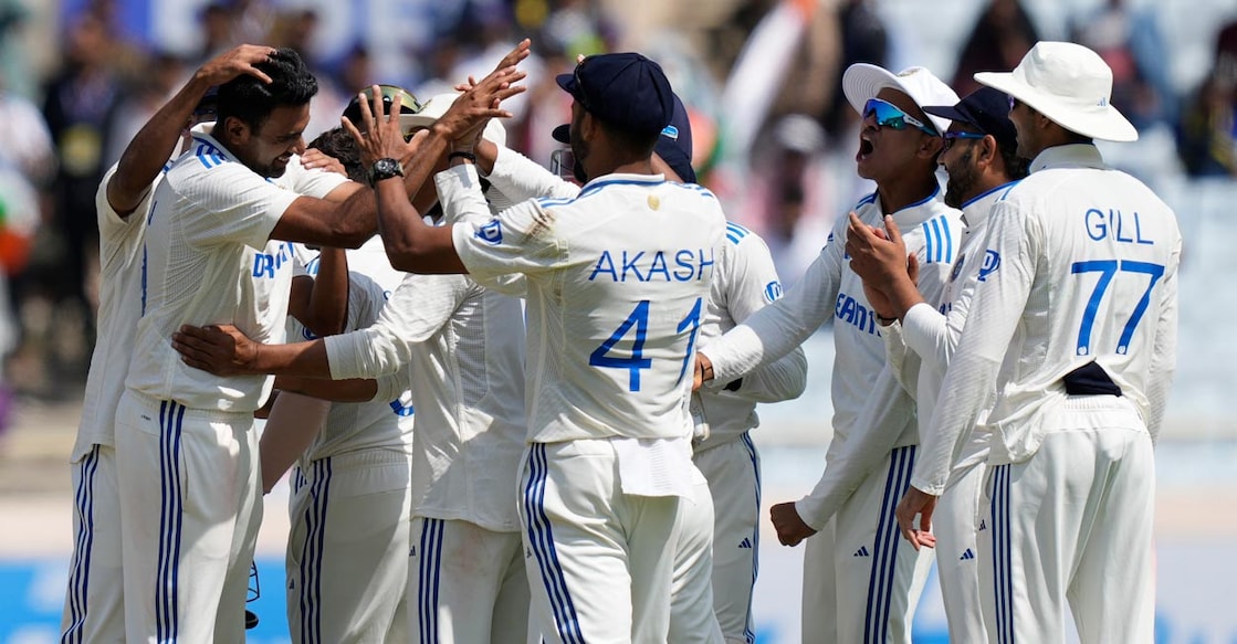 Ashwin Ashwin celebrates with teammates after taking the wicket of Jonny Bairstow. Photo: PTI/Vijay Verma