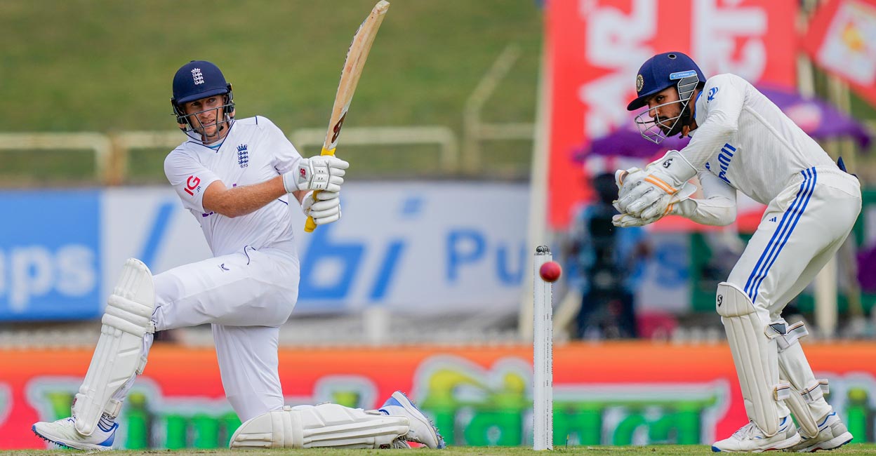 Joe Root plays a sweep shot. Photo: PTI/Vijay Verma