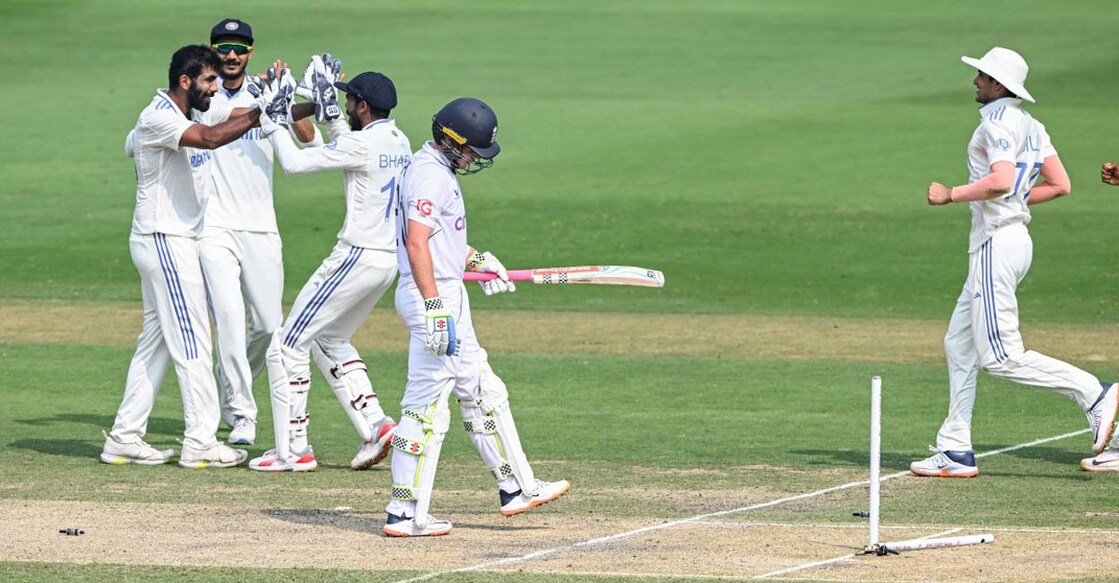 Jasprit Bumrah celebrates with teammates after castling Ollie Pope. Photo: AFP/Dibyangshu Sarkar