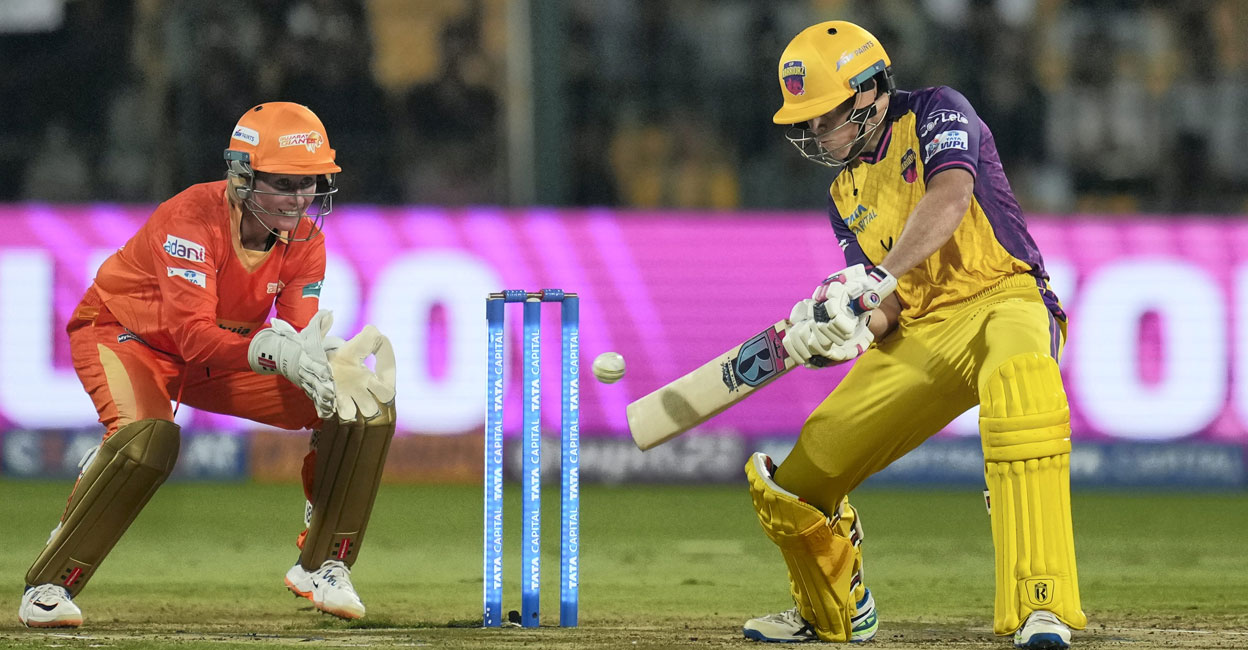 UP Warriorz' Grace Harris plays a shot against Gujarat Giants during a Women's Premier League match at M Chinnaswamy Stadium in Bengaluru on Friday. Photo: PTI