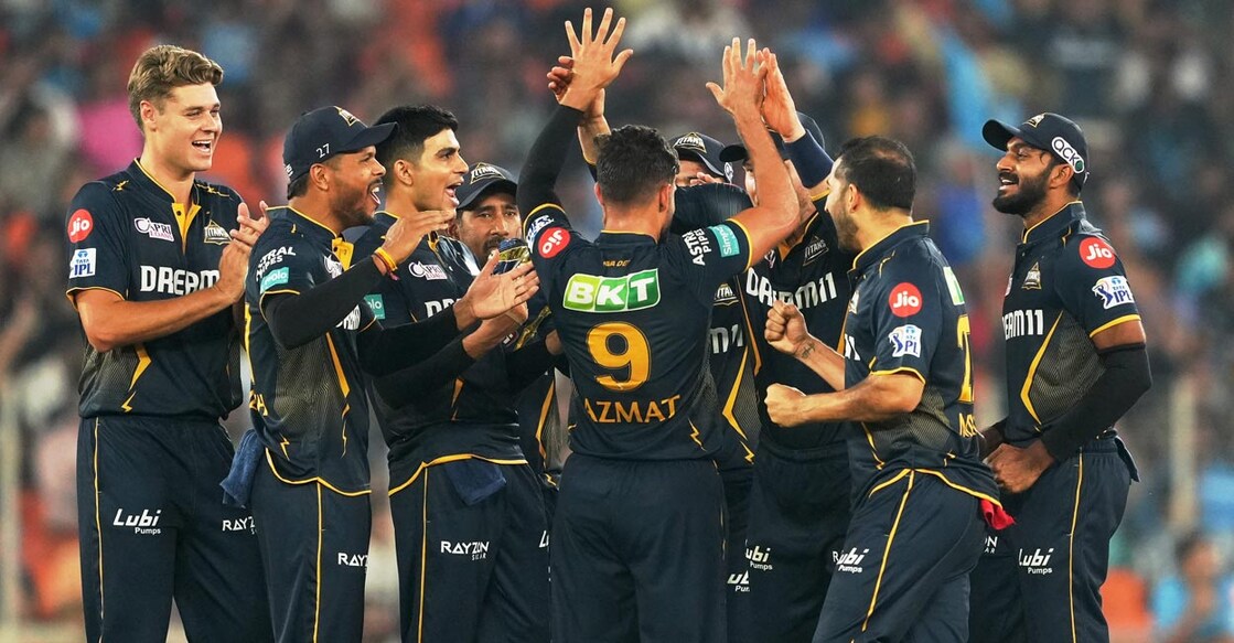 Gujarat Titans players celebrate a wicket. Photo: PTI/Kunal Patil