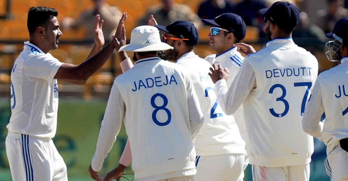 India's R Ashwin celebrates with teammates after removing Zak Crawley. Photo: PTI/Shahbaz Khan