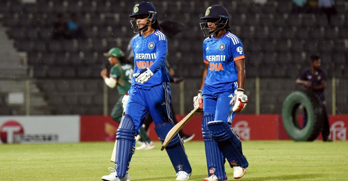 Smriti Mandhana and  Dayalan Hemalatha return to the pavilion. Photo: X@BCCIWomen