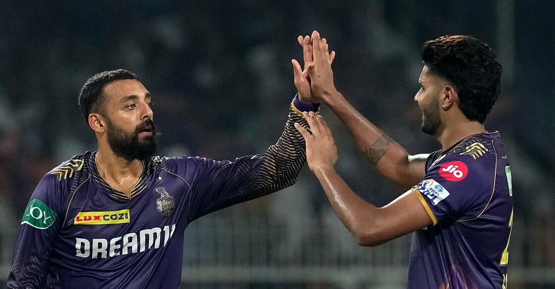 Varun Chakravarthy, left, was named player of the match. Photo: PTI/Swapan Mahapatra