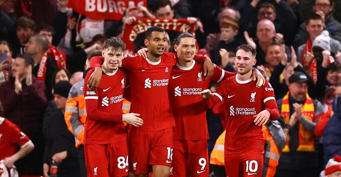 Liverpool players celebrate their third goal. Photo: Reuters/Carl Recine