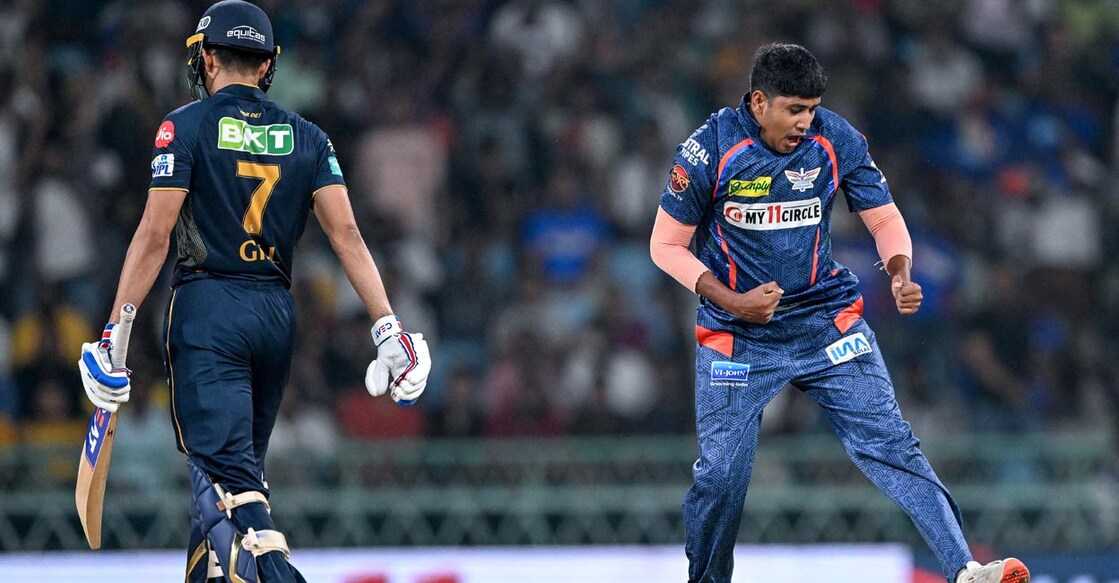 Yash Thakur celebrates after castling Shubman Gil. Photo: AFP/Sajjad Hussain