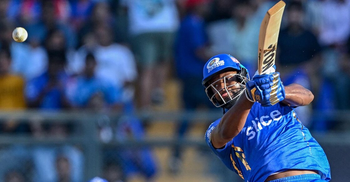 Romario Shepherd plays a big shot. Photo: AFP/Indranil Mukherjee