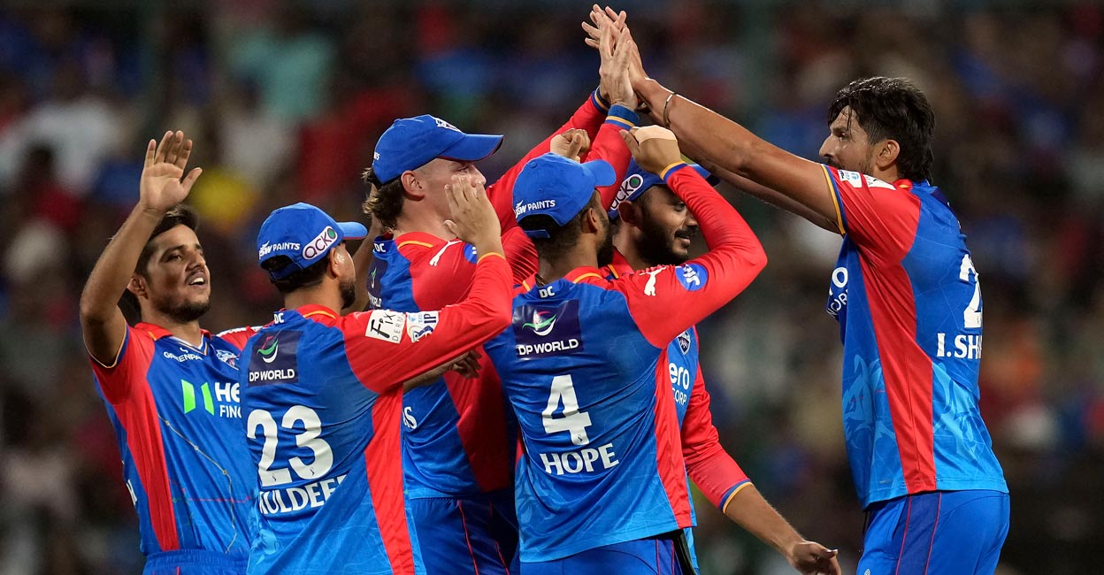 Ishant gets Kohli Ishant Sharma, right, celebrates with teammates after removing Virat Kohli. Photo: PTI: Shailendra Bhojak