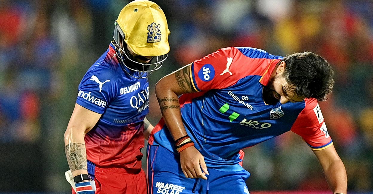 Ishant Sharma, right, celebrates after dismissing Virat Kohl. Photo: AFP/Idrees Mohammed