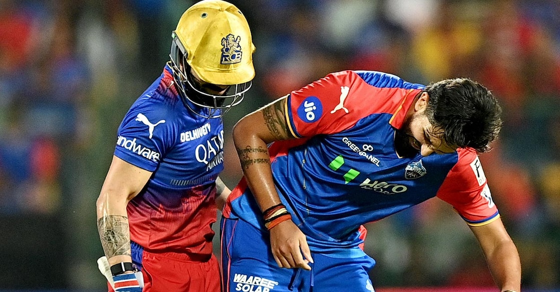 Ishant Sharma, right, celebrates after dismissing Virat Kohl. Photo: AFP/Idrees Mohammed