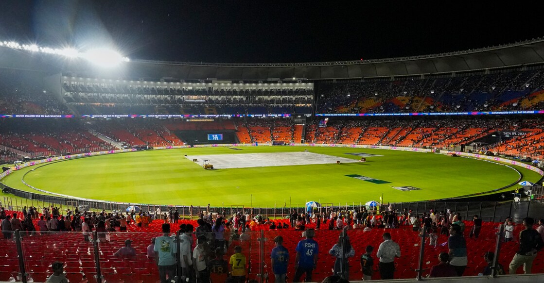 Fans wait for the start of the Indian Premier League (IPL) 2024 cricket match between Gujarat Titans and Kolkata Knight Riders, at Narendra Modi Stadium in Ahmedabad, Monday. Photo: PTI