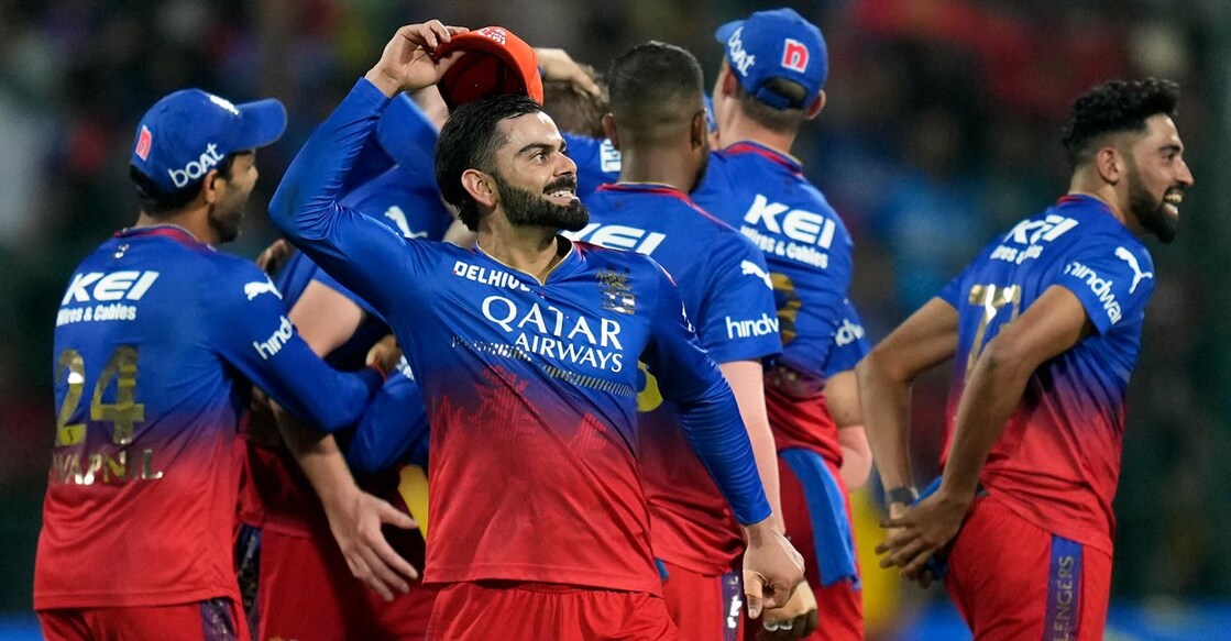 Virat Kohli leads RCB's celebrations. Photo: PTI/Shailendra Bhojak