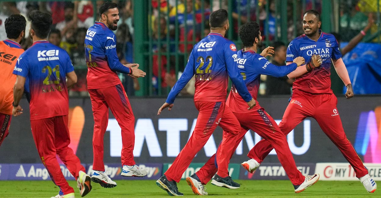 Yash Dayal, right, bowled a terrific final over for RCB. Photo: PTI/Shailendra Bhojak