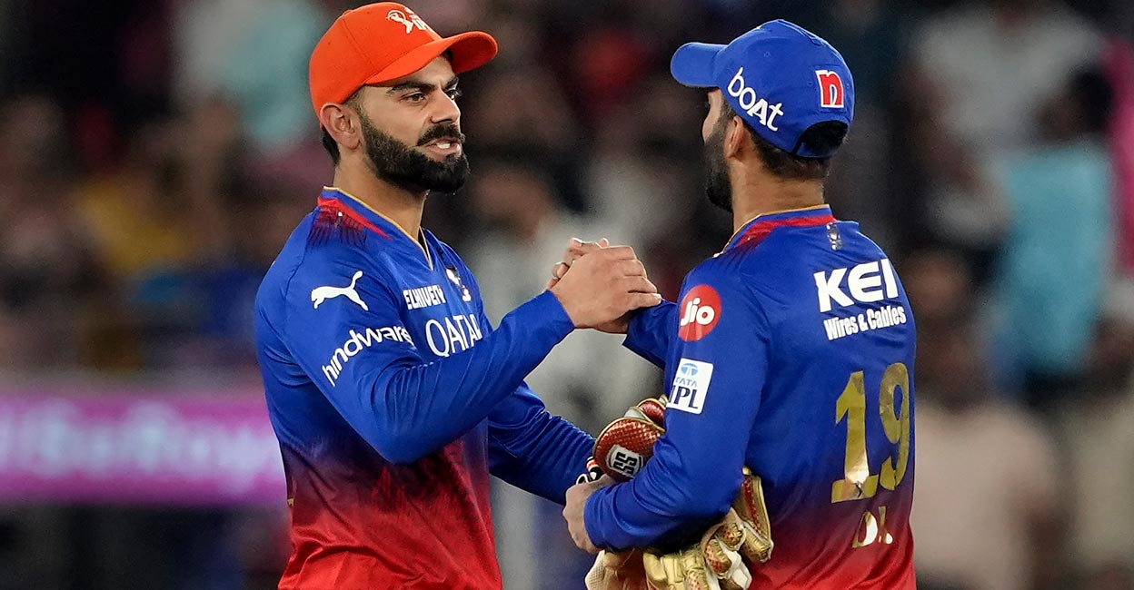 Kohli & DK Virat Kohli and Dinesh Karthik after the loss. Photo: PTI/Kunal Patil