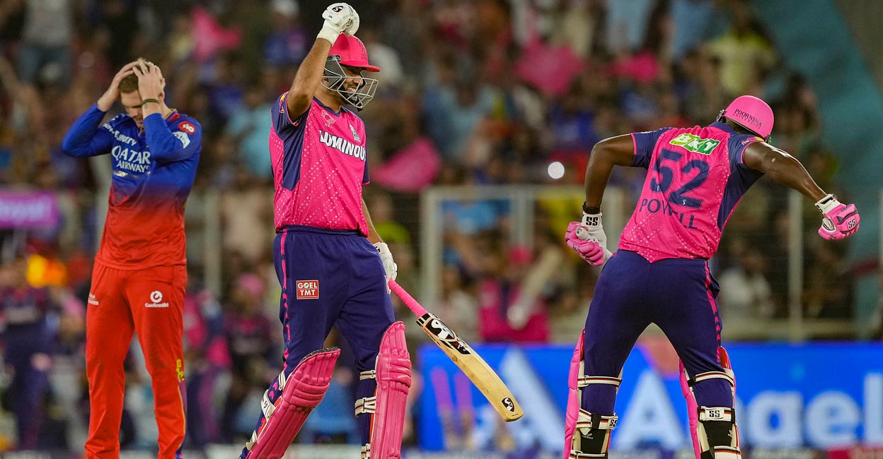 R Ashwin and Rovman Powell celebrate RR's win. Photo:: PTI/Kunal Patil