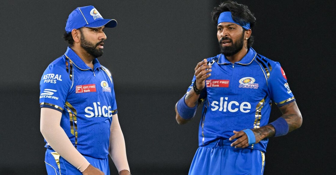 Rohit & Pandya Hardik Pandya, right, has struggled big time after replacing Rohit Sharma as Mumbai Indians captain. File photo: AFP/Punit Paranjpe