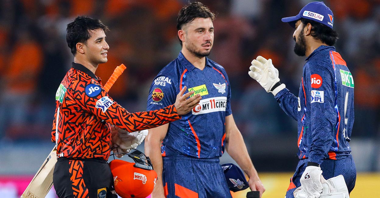 Sharma & KL LSG skipper K L Rahul, right, congratulates Abhishek Sharma. Photo: PTI