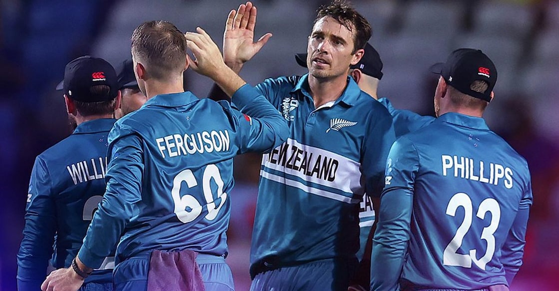 Tim Southee, second right, celebrates with teammates after a strike. Photo: X@ICC