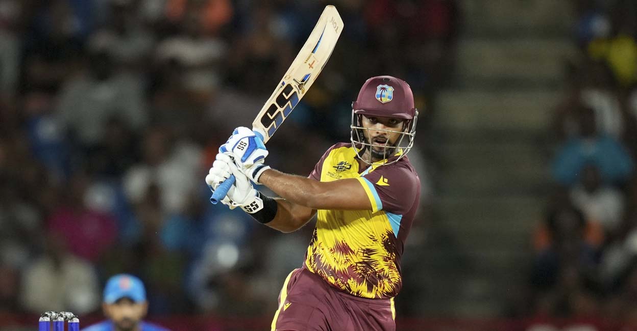 West Indies' Nicholas Pooran bats against Afghanistan during an ICC Men's T20 World Cup cricket match at Daren Sammy National Cricket Stadium in Gros Islet, Saint Lucia, Monday, June 17, 2024. AP/PTI(PTI06_18_2024_000009B)