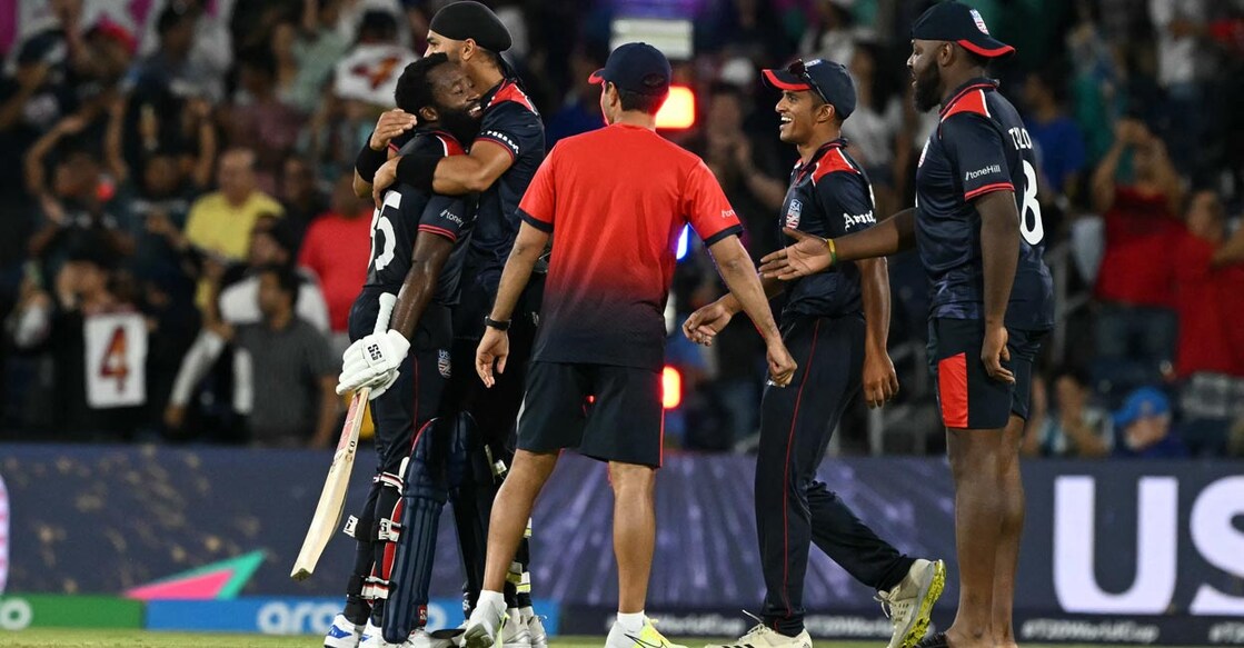 Aaron Jones, left, and teammates celebrate their win. Photo: AFP/Andrew Caballero-Reynolds