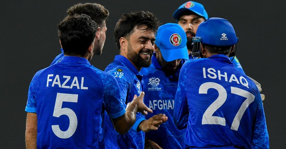 Rashid Khan, centre, led from the front for the Afghans. Photo: AFP/Randy Brooks