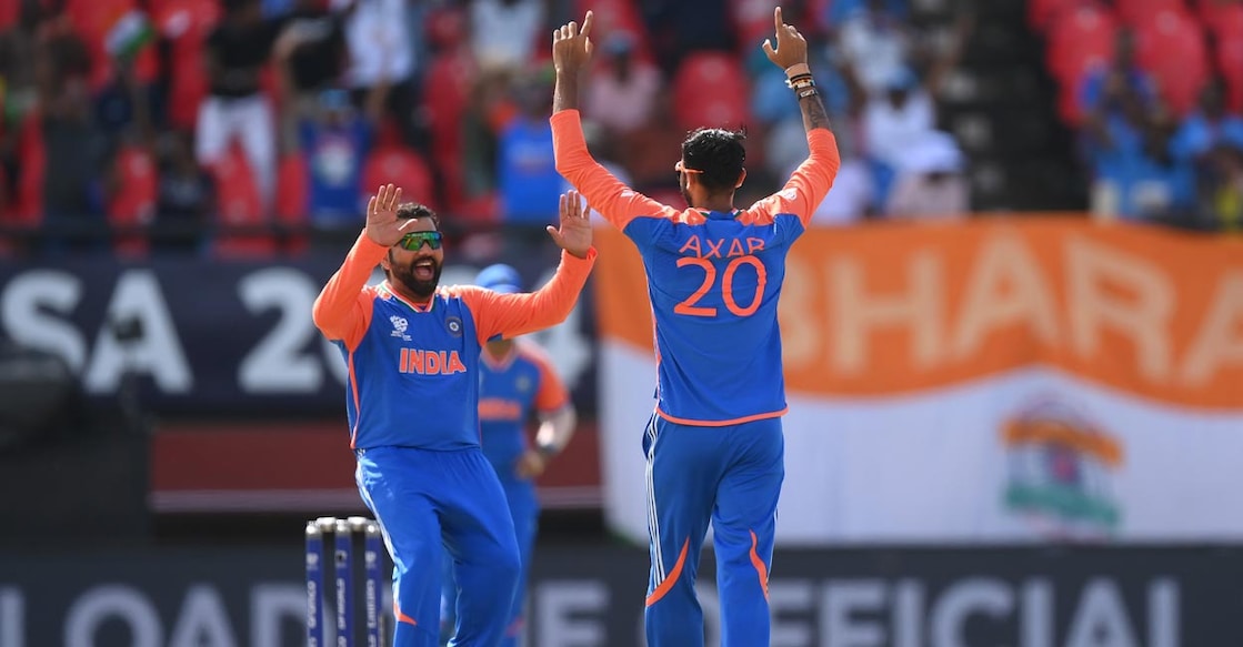 Rohit Sharma and Axar Patel Rohit Sharma and Axar Patel celebrate an England wicket in the semifinal. Photo: X@BCCI