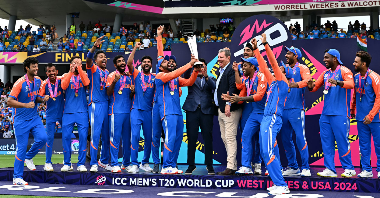 Team India celebrates with the trophy after winning the ICC men's Twenty20 World Cup 2024 final against South Africa at Kensington Oval in Bridgetown, Barbados, on June 29, 2024. Photo: AFP/ Chandan Khanna