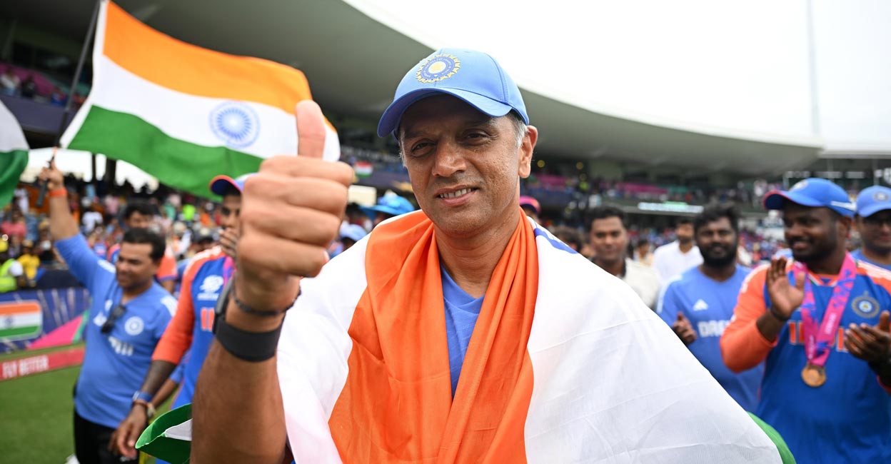 Rahul Dravid Rahul Dravid celebrates with the tricolour. Photo: X@BCCI