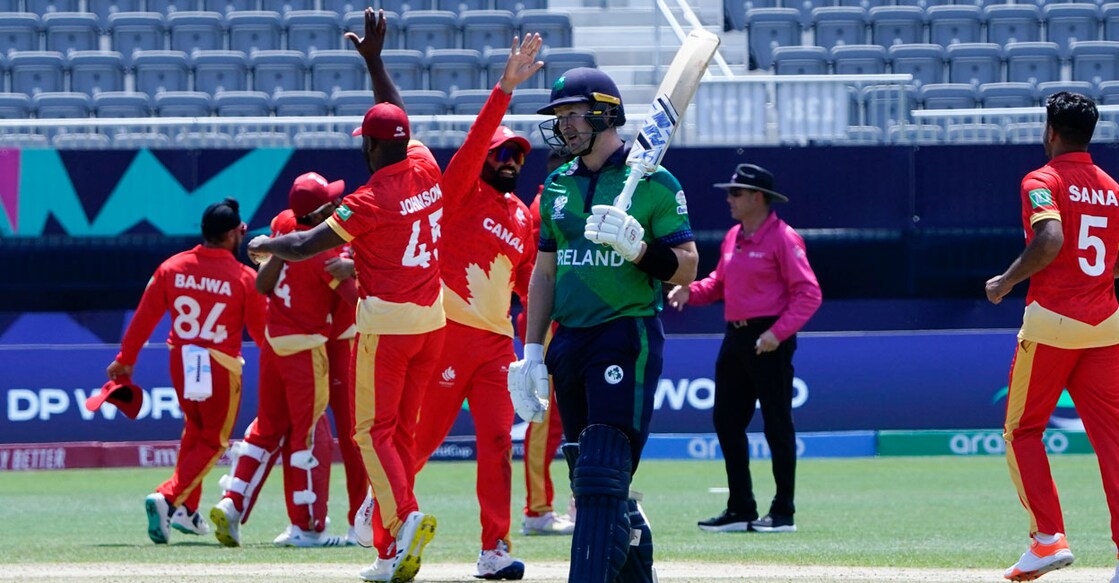 Ireland's Barry McCarthy walks back as Canada celebrates winning their T20 World Cup 2024 group A match at the Nassau County International Cricket Stadium in East Meadow, New York, on June 7, 2024. Photo: AFP/Timothy A Clary