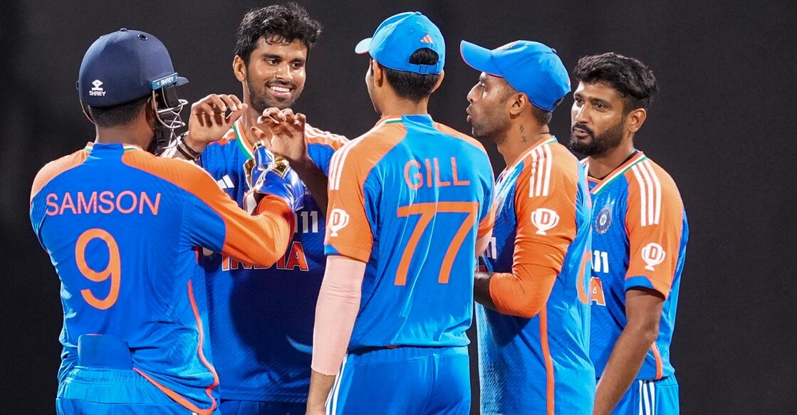 Team India Washington Sundar, second left, celebrates with teammates after picking up a wicket. Photo: PTI/Kunal Patil