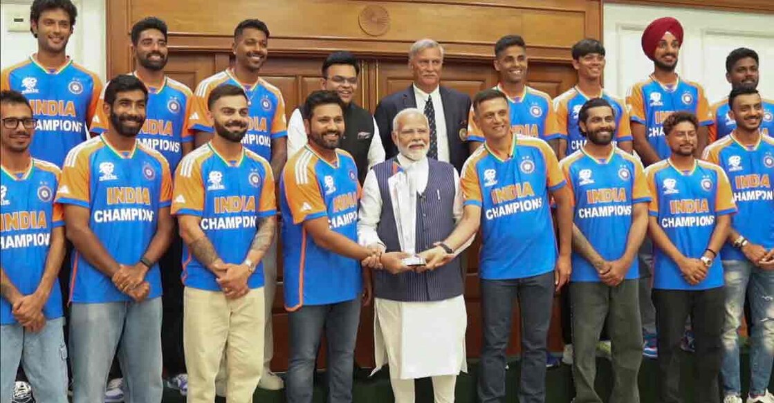 Prime Minister Narendra Modi poses for a group photograph with the 2024 T20 World Cup-winning Indian cricket team during an interaction, in New Delhi, Thursday, July 4, 2024. Photo: PTI