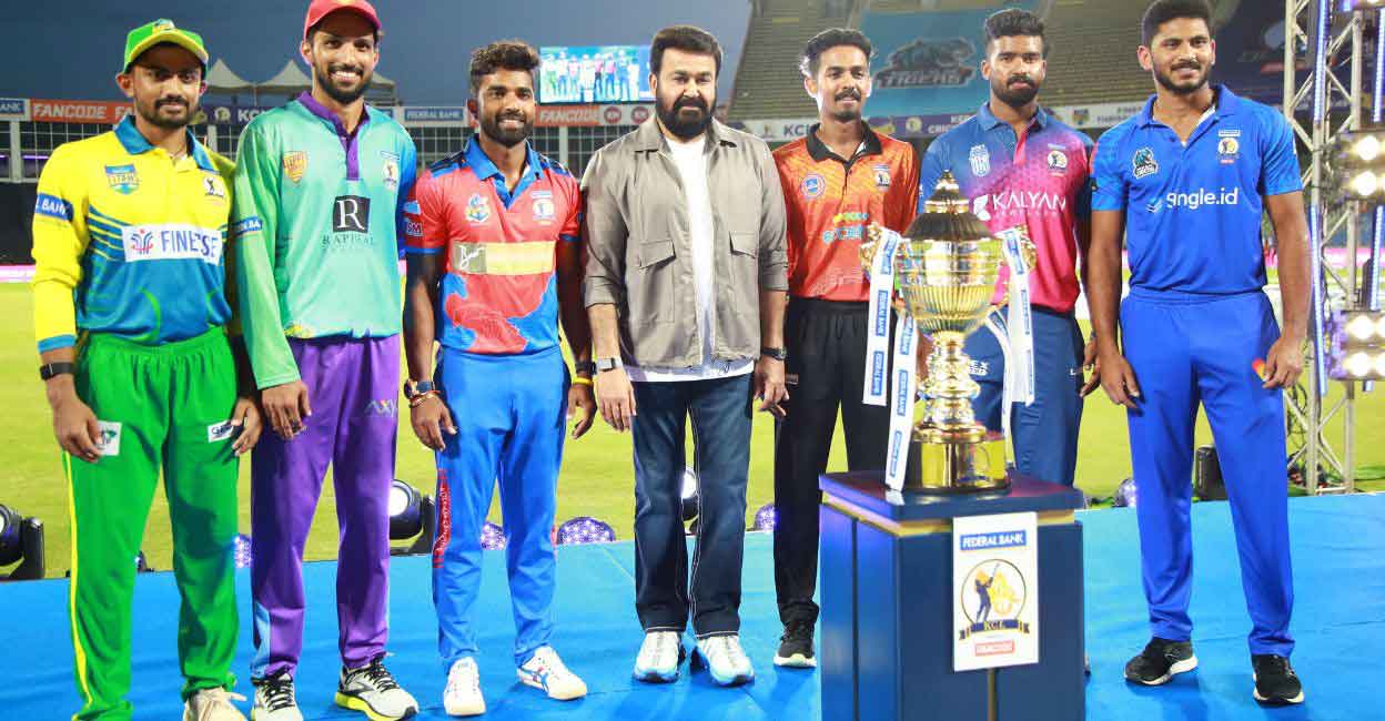 Untitled design - 1 Actor Mohanlal poses with the captains of the Kerala Cricket League teams at the Greenfield International Stadium in Thiruvananthapuram on Monday. Photo: Special arrangement